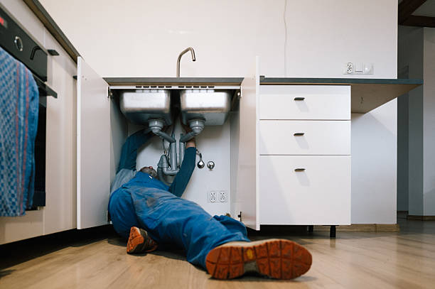 Professional Drain Cleaning technician working in Clear Lake, IA